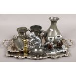 A quantity of silver plate and pewter including tankards, candlesticks and a serving tray etc.
