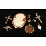 A box of 9ct gold jewellery including cameo brooch, swivel fob, charms and pendants etc.