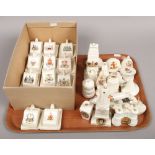 A tray of World War One crested china along with a box of crested miniature cheese dishes.