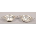 A pair of silver twin handle dishes assayed Birmingham 1942.