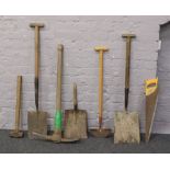 A quantity of garden tools to include lawn edger, pickaxe, shovels etc.
