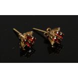 A pair of vintage 9ct gold garnet stud earrings, London 1969.