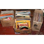 Three boxes of L.Ps and singles to include Shirley Bassey, ABBA, Cliff Richard etc.