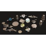 A box of vintage silver jewellery and collectables including brooches and thimbles etc.