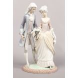 A large Lladro figure group formed as a courting couple including 17th century attire.Condition