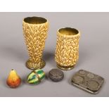 A small lot of collectables Sylvac vases, Limoges pill boxes in the form of fruit and a pocket