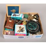 A group lot of collectables compasses, Diecast sharpeners, Rolls razor, military items etc.