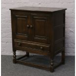 An Ercol hutch cupboard with single drawer.