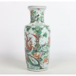 A large 19th century Chinese famille verte rouleau vase. Painted in coloured enamels with peacocks