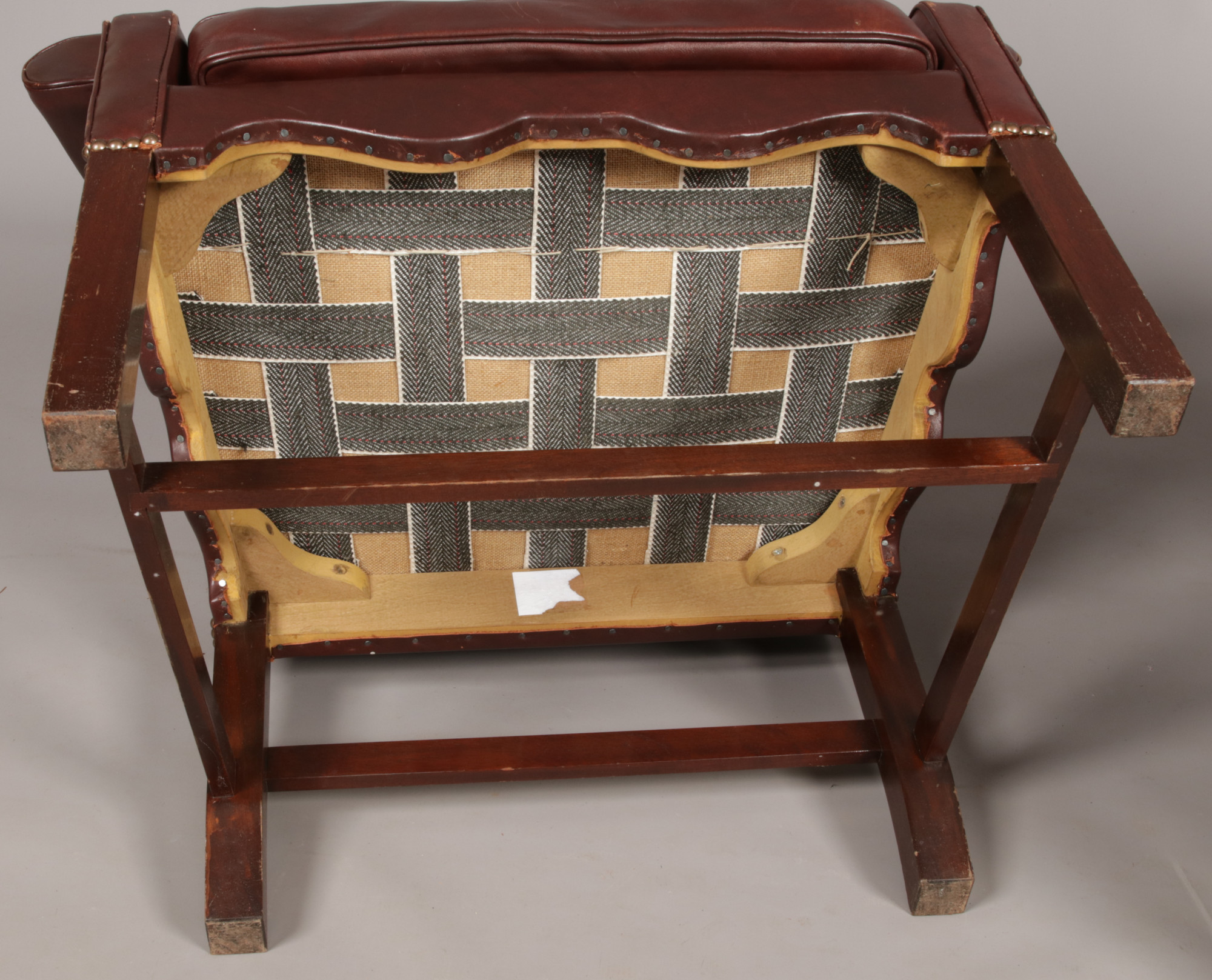 A pair of early 20th century leather upholstered camel back armchairs with brass studwork and raised - Image 3 of 3