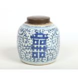 An 18th century Chinese blue and white ginger jar with associated metal cover. Painted in underglaze