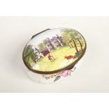 An 18th century Staffordshire enamel oval snuff box with hinged cover. Decorated to the top with a