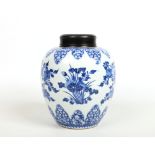 A 19th century Chinese blue and white ginger jar with associated carved and pierced hardwood