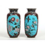 A pair of Japanese Meiji period cloisonne vases. With blue ground panels decorated with