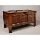 A period oak panelled coffer of pegged construction. With carved decorations and internal candle