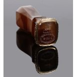 A 19th century banded agate desk seal with gilt metal mount. The small rectangular matrix carved