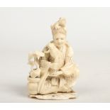 A Japanese Meiji period carved ivory okimono. Modelled as a figure kneeling upon a lotus leaf with