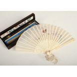 A 19th century Cantonese ivory fan in lacquered case with retailers stamp for Luen Shing, Canton.