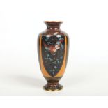 A Japanese Meiji period cloisonne vase. Decorated on a speckled orange ground with panels containing
