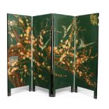 A 20th century Chinese lacquered and brass wirework four fold dressing screen. Dark green ground