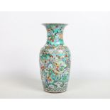 A 19th century Chinese famille verte baluster shaped vase. Enamelled with two continuing bands of