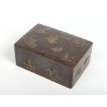 A Japanese Meiji period mixed metal box with hinged cover. Decorated with birds and flowers on an