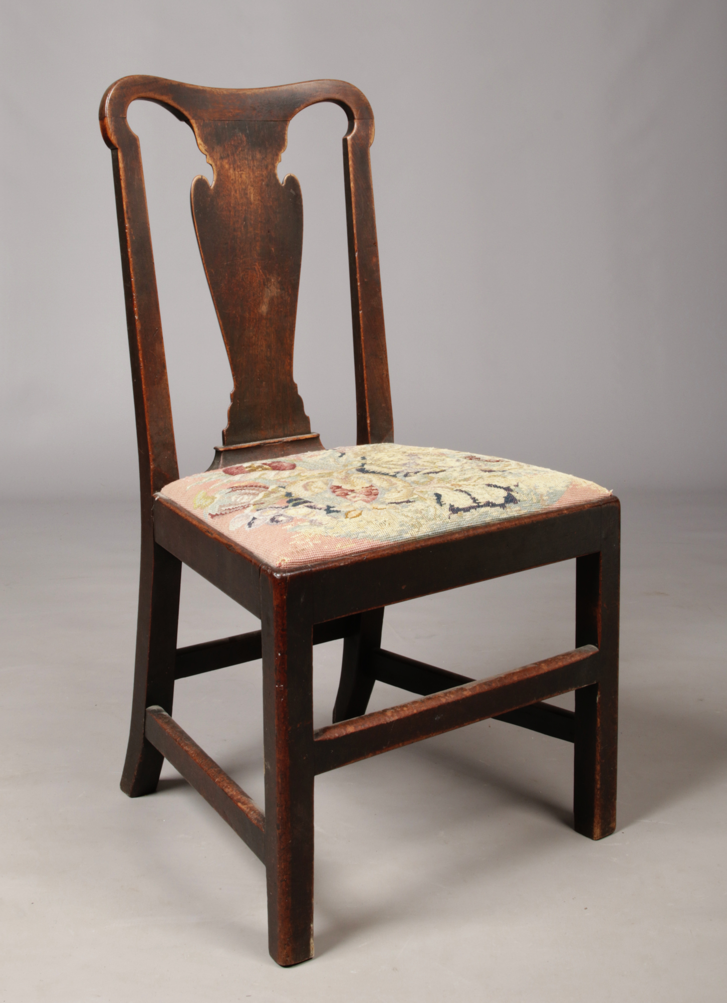 A Georgian mahogany side chair with flat baluster shaped splat.
