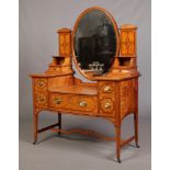 A Victorian Sheraton revival satinwood dressing table by James Shoolbred & Co. Crossbanded in