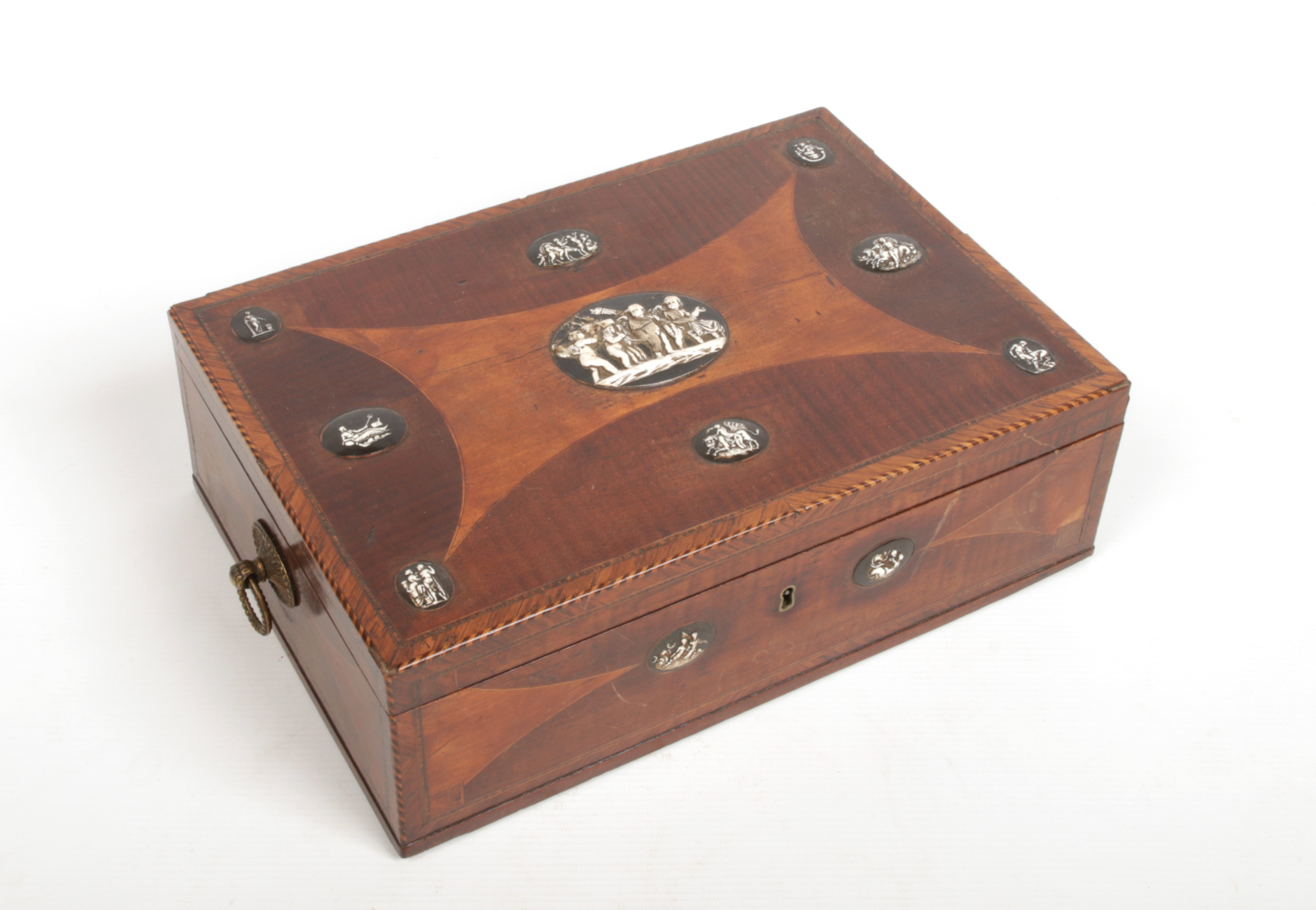 A Regency mahogany table box with brass loop handles. Crossbanded, inlaid and adorned with eleven