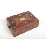 A Regency mahogany table box with brass loop handles. Crossbanded, inlaid and adorned with eleven