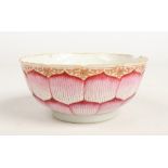 An 18th century Chinese bowl moulded in relief and enamelled in the form of a lotus flower and