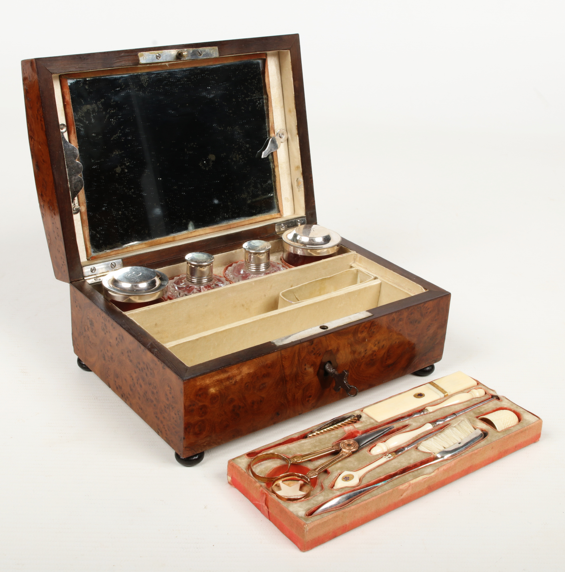A 19th century French burr walnut necessaire raised on squat bun feet. With hinged and mirrored - Image 2 of 4