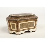 A 19th century Persian wood, brass and ivory micro mosaic casket of canted rectangular form and