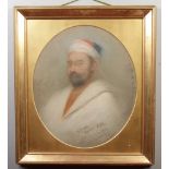 Theodore Cook. A 19th century pastel portrait of a gentleman in middle eastern attire, in gilt