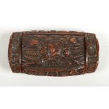 A 19th century coquilla nut snuff box with hinged cover. Carved with a profile portrait bust and