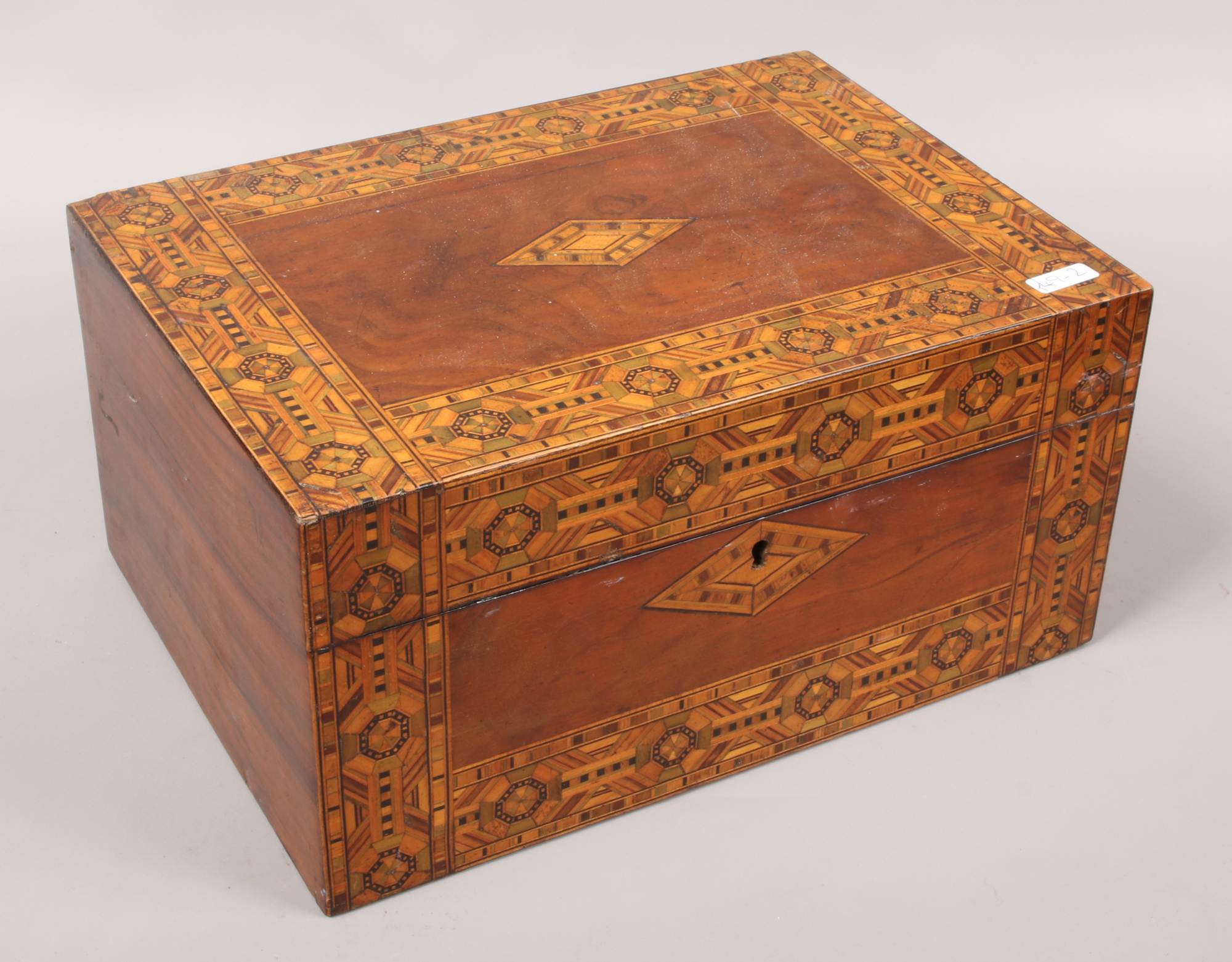 A Victorian walnut box with Tunbridge inlaid banding.