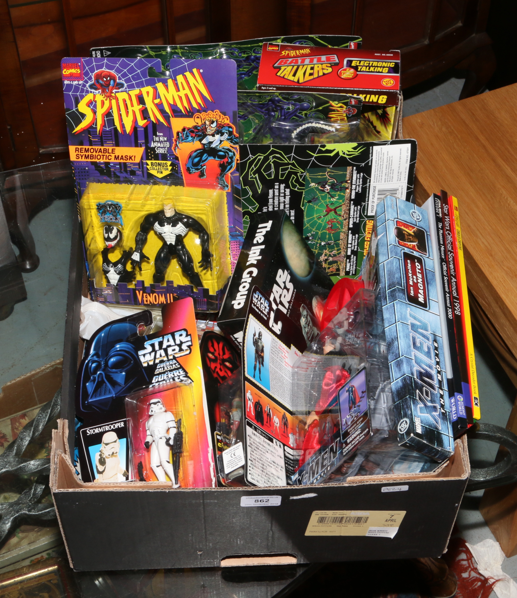 A box of comic book heros and villans on card some opened to include Star Wars, XMen, Spiderman