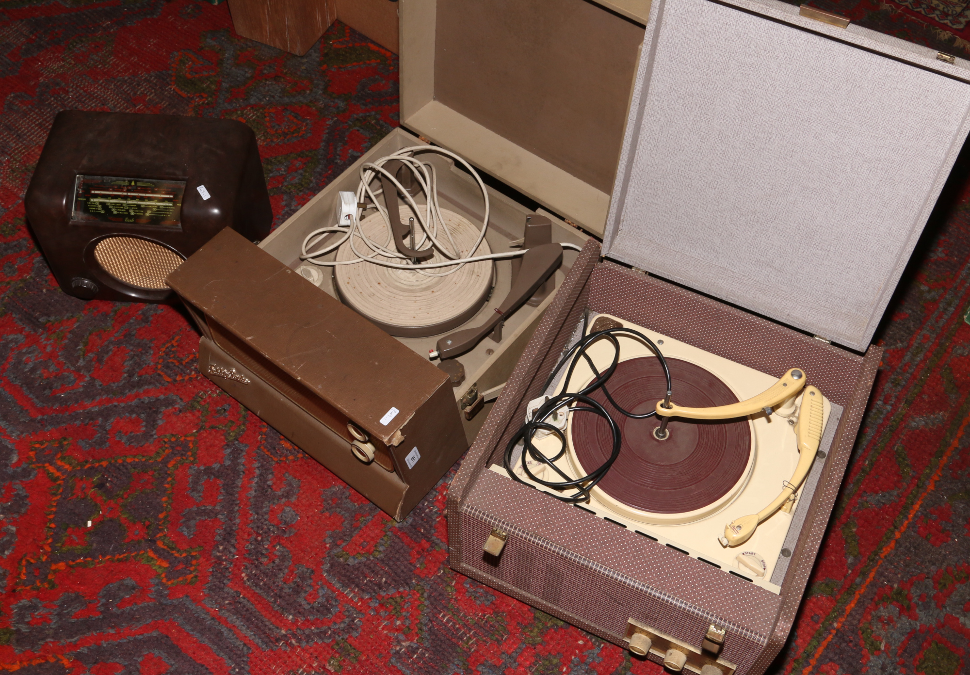 Two vintage portable record players; Ecko and Fidelity radio along with a Bush Bakelite valve