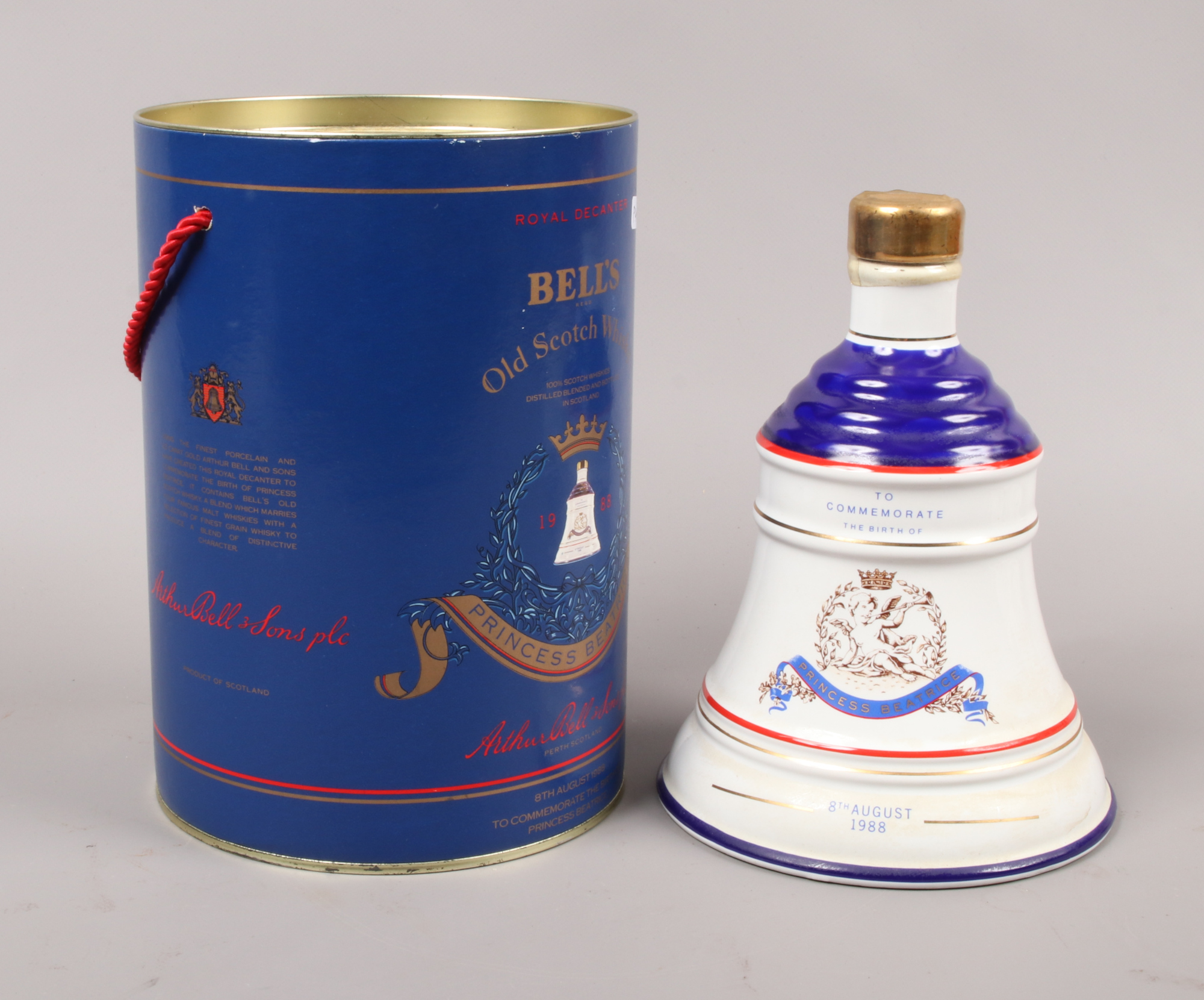 A boxed Wade Bells Whisky decanter commemorative Princess Beatrice's birth. Full and sealed.