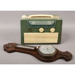 A vintage Vidor valve radio along with oak Change barometer Condition report intended as a guide