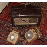 A vintage Cossor Melody maker radio for repair, along with two vintage Rotary dial telephones.