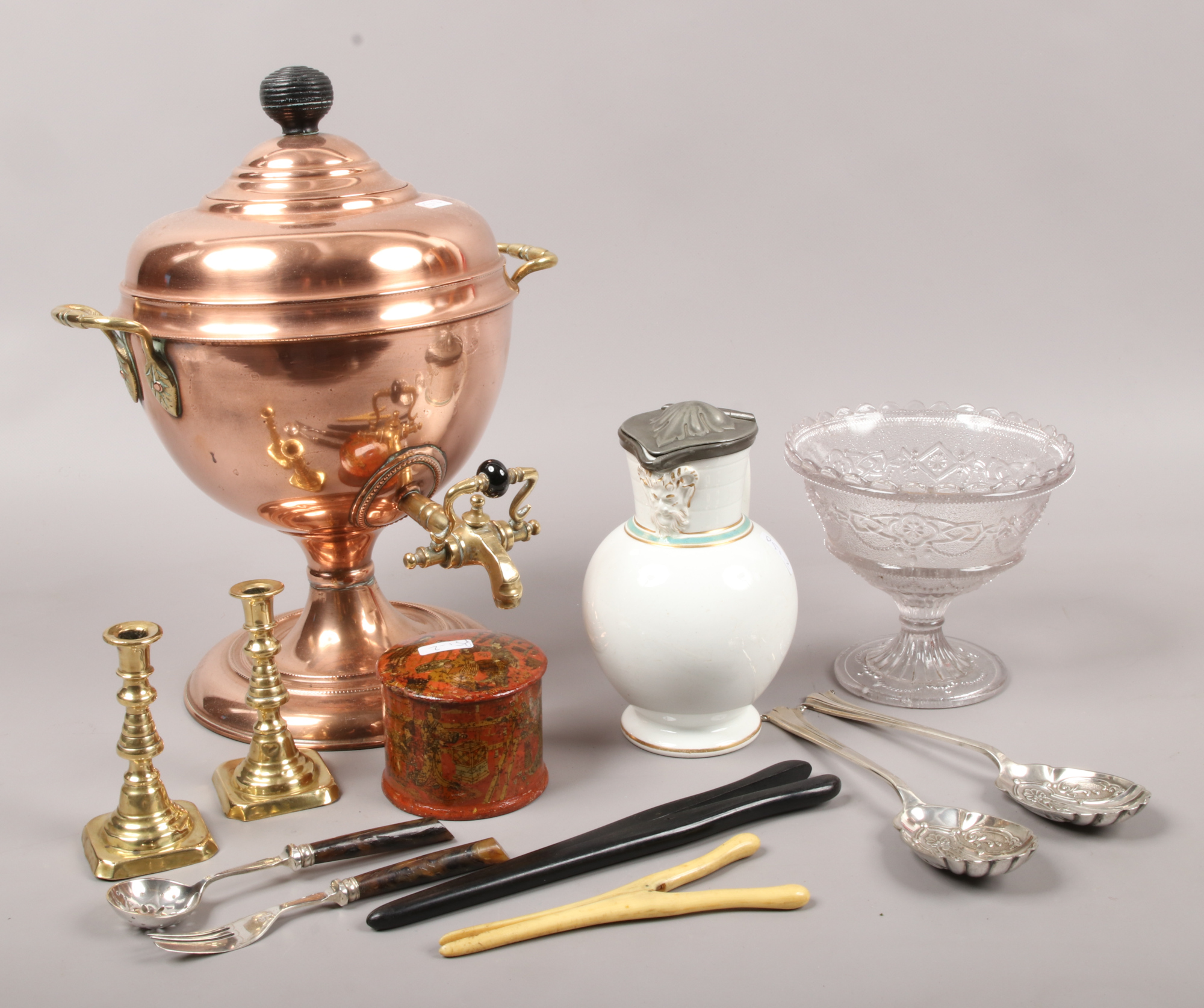 A group of collectables including pewter lidded Wedgwood pearlware jug, copper and brass tea urn,