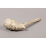 A Buffalo's clay pipe.