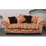 A good quality three seat sofa upholstered in red and gold velvet moquette upholstery raised on