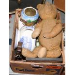 A box of miscellaneous ceramics to include vintage teddy bear, cabinet plates and chamber pots