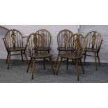 A set of six Ercol Prince of Wales dining chairs to include two carvers.
