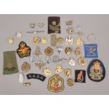 A collection of military badges to include A. R. P Royal Navy, Royal Engineers, Air Training Corps