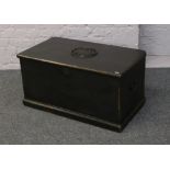 A painted hardwood Chinese blanket box with papered interior.