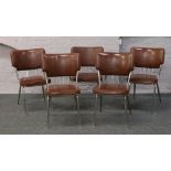 A set of four plus one carver retro chrome dining chairs with vinyl upholstery.