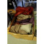 Box of scarves and handbags